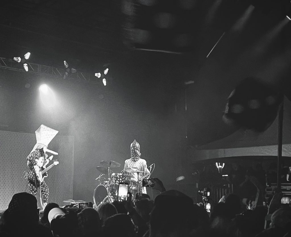 Angine de Poitrine, with inflatable dice flying above the crowd